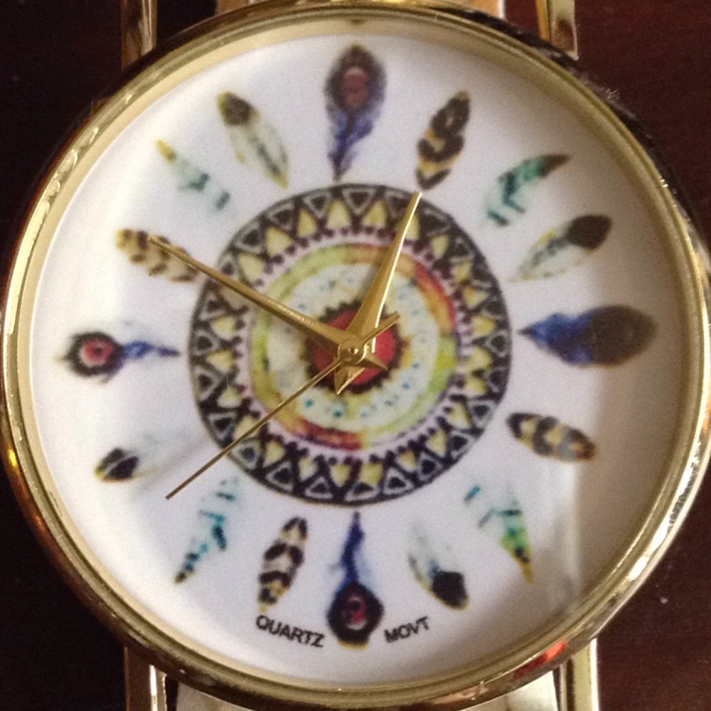 NWOT Feather faced Watch